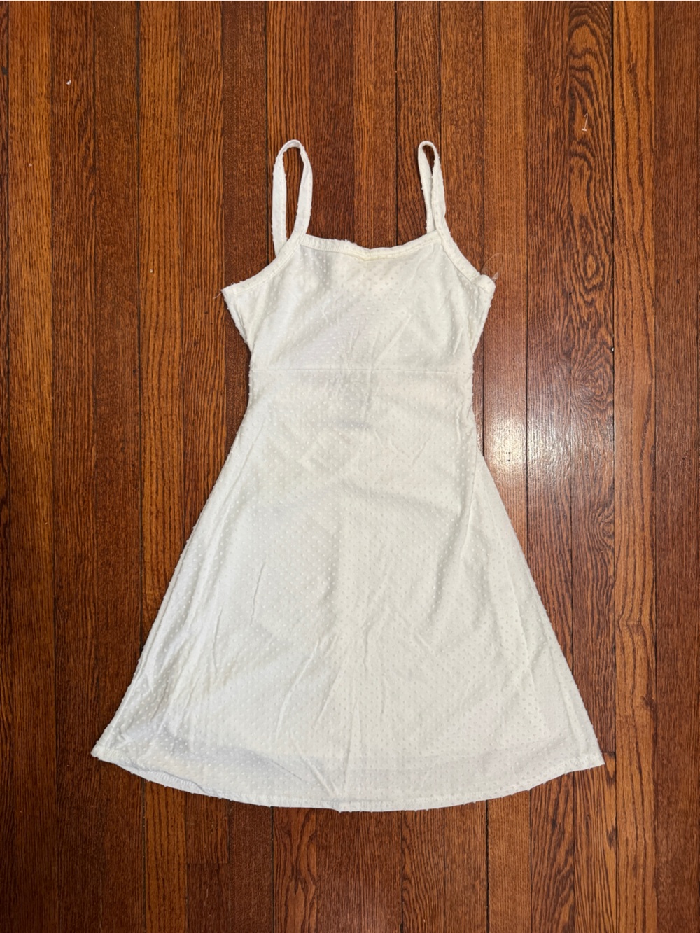 Olivia Rae White Mini Sundress with Spaghetti Straps and tie back and lining